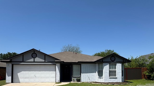1817 Dusk Dr, Killeen, TX 76543 - ranch-style house featuring brick siding, an attached garage, concrete driveway, and roof with shingles