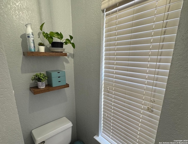 1817 Dusk Dr, Killeen, TX 76543 - bathroom with toilet and a textured wall
