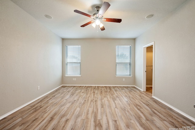 5752 Ping Way, Schertz, TX 78108 - empty room featuring light wood-type flooring, ceiling fan, and baseboards