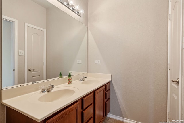 5752 Ping Way, Schertz, TX 78108 - bathroom with double vanity and baseboards