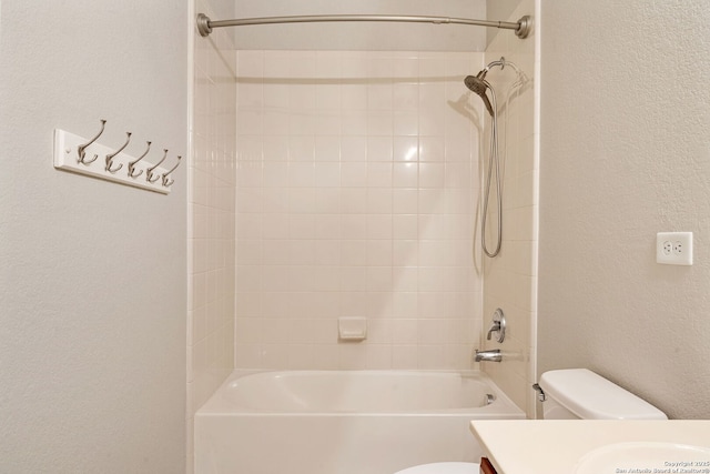 5752 Ping Way, Schertz, TX 78108 - bathroom with toilet, vanity, shower / washtub combination, and a textured wall