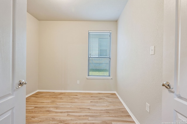 5752 Ping Way, Schertz, TX 78108 - unfurnished room with wood finished floors and baseboards