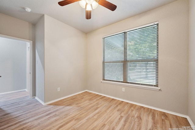 5752 Ping Way, Schertz, TX 78108 - empty room with wood finished floors, a ceiling fan, and baseboards