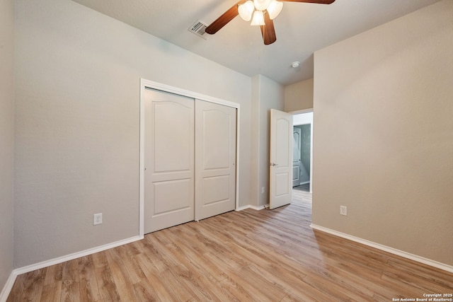 5752 Ping Way, Schertz, TX 78108 - unfurnished bedroom featuring light wood-style flooring, baseboards, a closet, and a ceiling fan