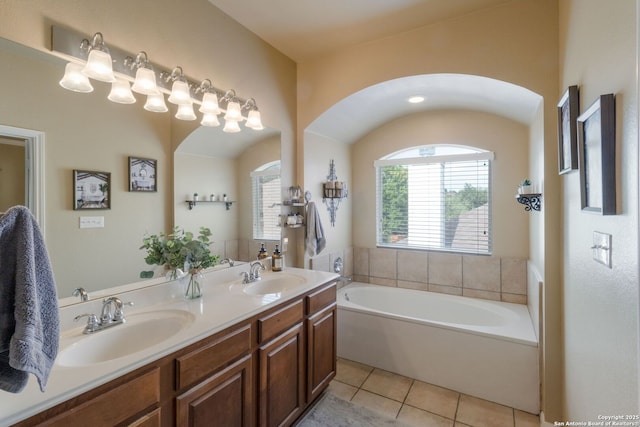 219 Roan Spg, San Antonio, TX 78258 - full bathroom featuring double vanity, a bath, and tile patterned floors