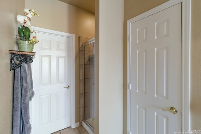 219 Roan Spg, San Antonio, TX 78258 - bathroom with a stall shower and tile patterned floors