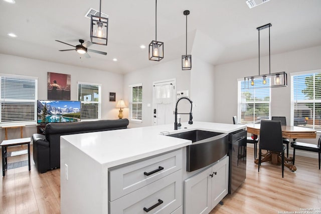 239 Porter, San Antonio, TX 78210 - kitchen featuring a sink, dishwasher, light wood-style floors, open floor plan, and recessed lighting