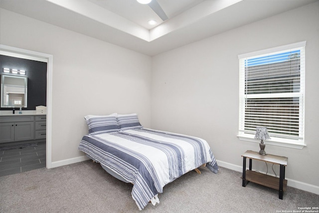 239 Porter, San Antonio, TX 78210 - bedroom with carpet, baseboards, ensuite bath, recessed lighting, and a sink