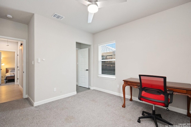 239 Porter, San Antonio, TX 78210 - home office featuring ceiling fan, carpet floors, and baseboards