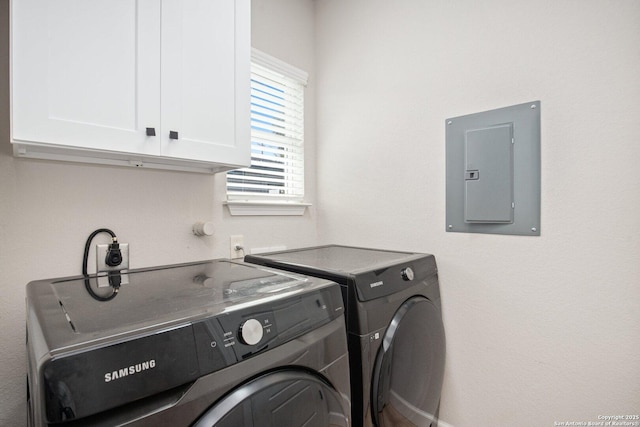 239 Porter, San Antonio, TX 78210 - laundry room with electric panel, cabinet space, and washing machine and dryer