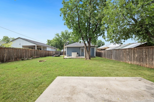 239 Porter, San Antonio, TX 78210 - view of yard with a patio and an outdoor fire pit