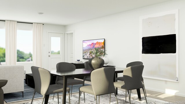 1415 Neria Loop, San Antonio, TX 78224 - dining area with baseboards and light wood finished floors