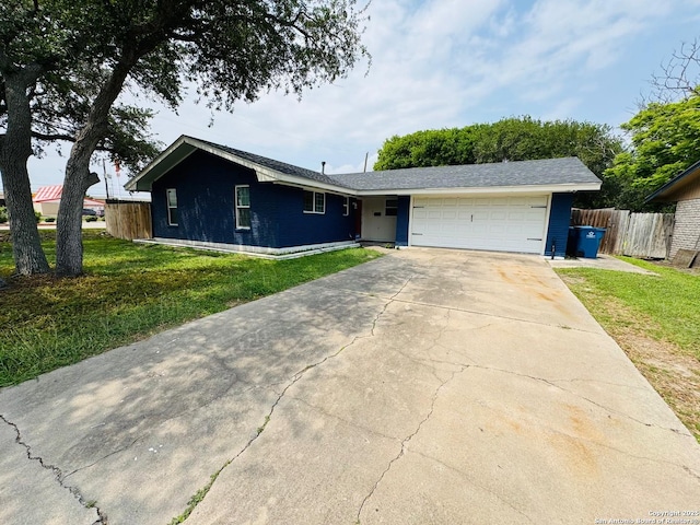 101 Ghent Pl, Portland, TX 78374 - ranch-style home featuring an attached garage and concrete driveway