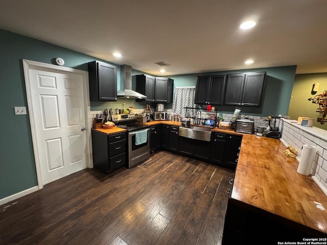 101 Ghent Pl, Portland, TX 78374 - kitchen featuring wall chimney exhaust hood, stainless steel electric range, butcher block counters, a sink, and dark cabinetry