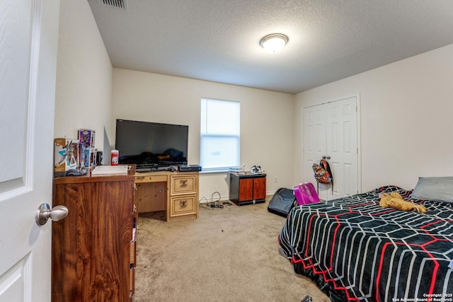 8514 Bayliss Pt, San Antonio, TX 78252 - carpeted bedroom with a textured ceiling