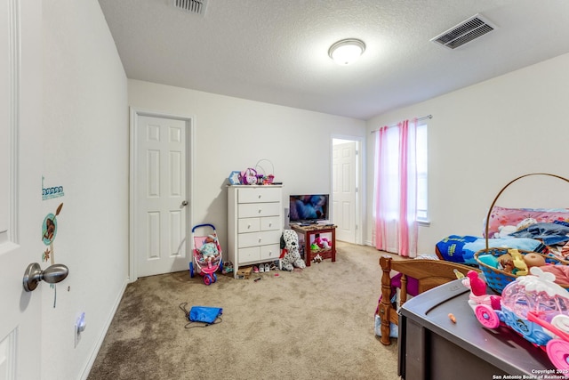 8514 Bayliss Pt, San Antonio, TX 78252 - carpeted bedroom featuring a textured ceiling and baseboards