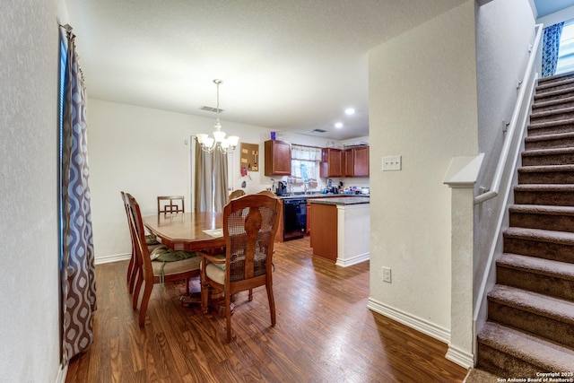 8514 Bayliss Pt, San Antonio, TX 78252 - dining area with dark wood-style flooring, stairs, a chandelier, baseboards, and recessed lighting