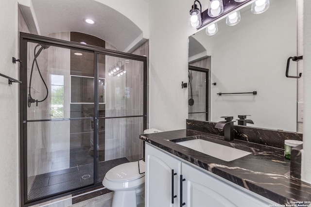 623 Recio St, San Antonio, TX 78225 - full bath with vanity, toilet, and a shower stall