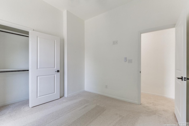 623 Recio St, San Antonio, TX 78225 - unfurnished bedroom with carpet floors, a closet, and baseboards