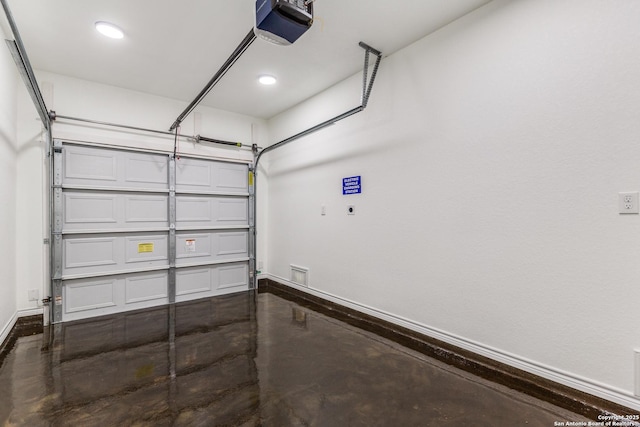 623 Recio St, San Antonio, TX 78225 - garage with a garage door opener, baseboards, and recessed lighting