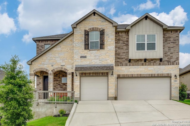 28806 Oldlyme, San Antonio, TX 78260 - french provincial home with board and batten siding, stone siding, and an attached garage