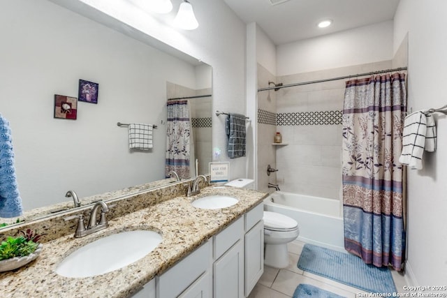 28806 Oldlyme, San Antonio, TX 78260 - bathroom featuring toilet, double vanity, tile patterned floors, and shower / bath combo with shower curtain