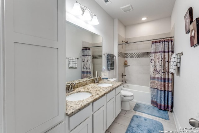 28806 Oldlyme, San Antonio, TX 78260 - full bathroom featuring double vanity, toilet, shower / bath combination with curtain, tile patterned flooring, and baseboards