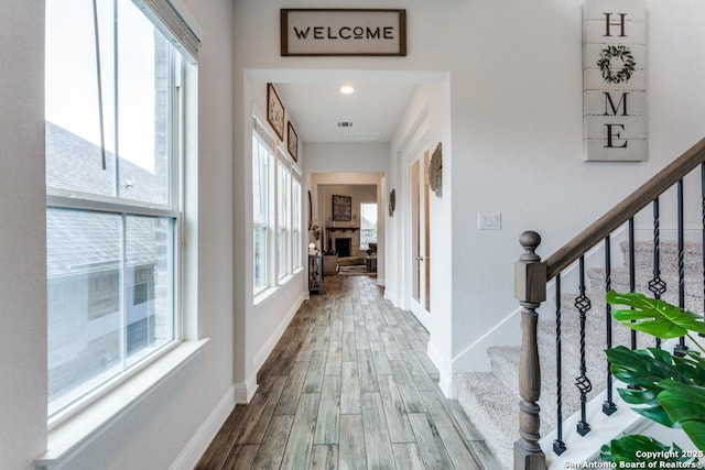 28806 Oldlyme, San Antonio, TX 78260 - hall featuring wood finished floors, stairway, and baseboards