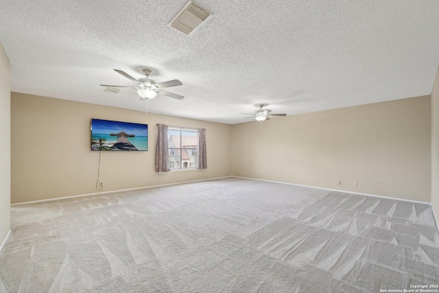 10222 Eagle Blf, San Antonio, TX 78249 - carpeted spare room featuring a ceiling fan, baseboards, and a textured ceiling