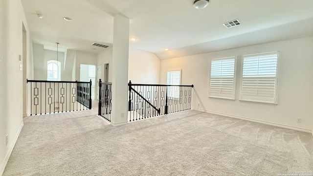 10828 Bango Farms, San Antonio, TX 78254 - carpeted empty room featuring baseboards, vaulted ceiling, recessed lighting, and a smoke detector