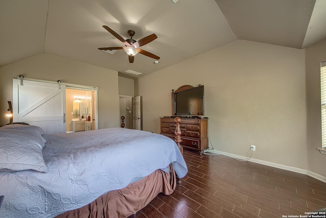 1009 Oak Rdg, Schertz, TX 78154 - bedroom featuring vaulted ceiling, a barn door, dark wood-style floors, baseboards, and a ceiling fan