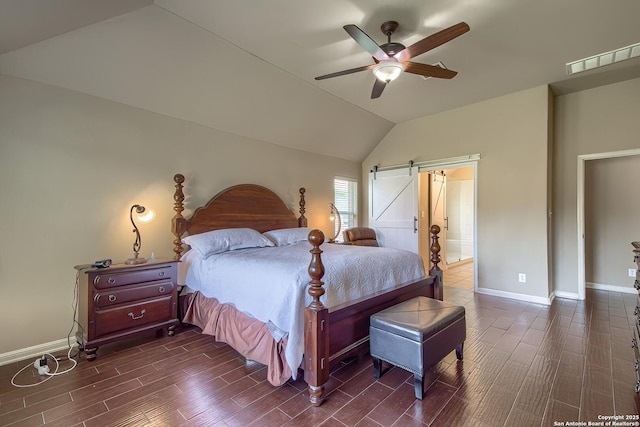 1009 Oak Rdg, Schertz, TX 78154 - bedroom with vaulted ceiling, baseboards, dark wood-type flooring, a ceiling fan, and ensuite bath