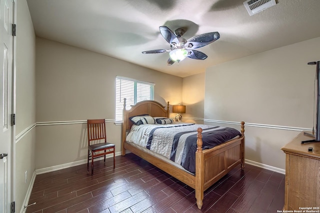 1009 Oak Rdg, Schertz, TX 78154 - bedroom with baseboards, wood finished floors, and a ceiling fan