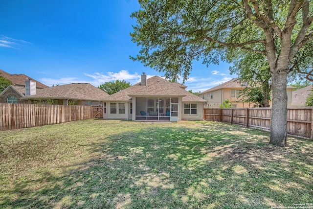 1009 Oak Rdg, Schertz, TX 78154 - rear view of house with a sunroom and a chimney