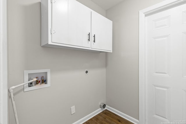 371 Pike, San Antonio, TX 78209 - washroom featuring cabinet space, washer hookup, electric dryer hookup, baseboards, and dark wood finished floors