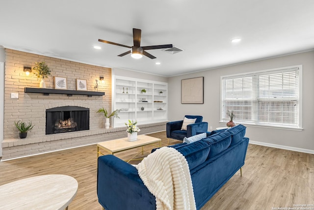 371 Pike, San Antonio, TX 78209 - living room with a ceiling fan, wood finished floors, a fireplace, baseboards, and recessed lighting