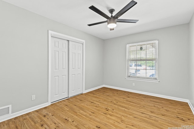 371 Pike, San Antonio, TX 78209 - unfurnished bedroom with light wood-type flooring, baseboards, a closet, and ceiling fan