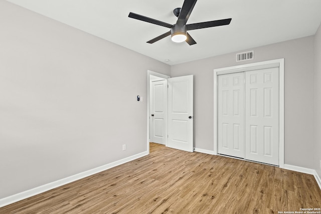 371 Pike, San Antonio, TX 78209 - unfurnished bedroom featuring baseboards, wood finished floors, a closet, and ceiling fan