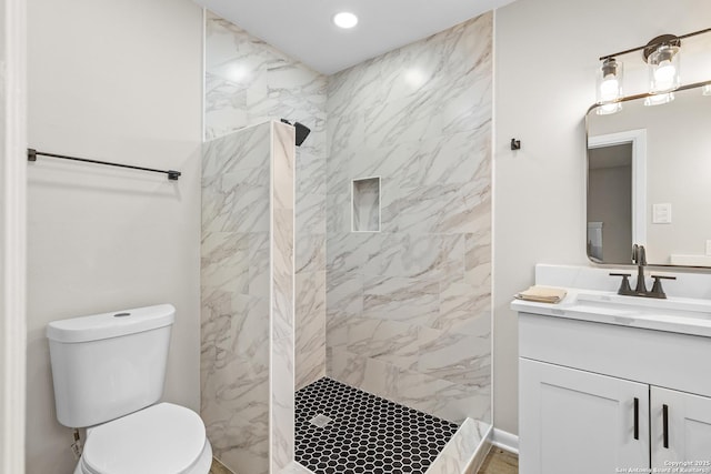 371 Pike, San Antonio, TX 78209 - full bathroom featuring vanity, a tile shower, toilet, and recessed lighting