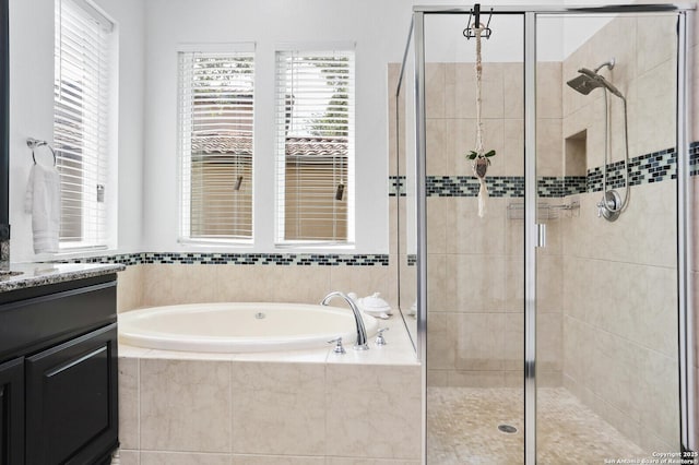 22450 Viajes, San Antonio, TX 78261 - bathroom featuring a bath, a stall shower, and vanity