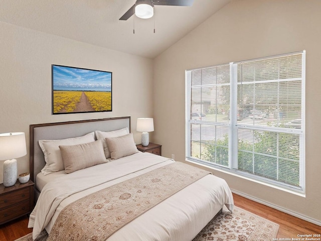 7319 Tranquillo Way, San Antonio, TX 78266 - bedroom featuring vaulted ceiling, wood finished floors, baseboards, and a ceiling fan