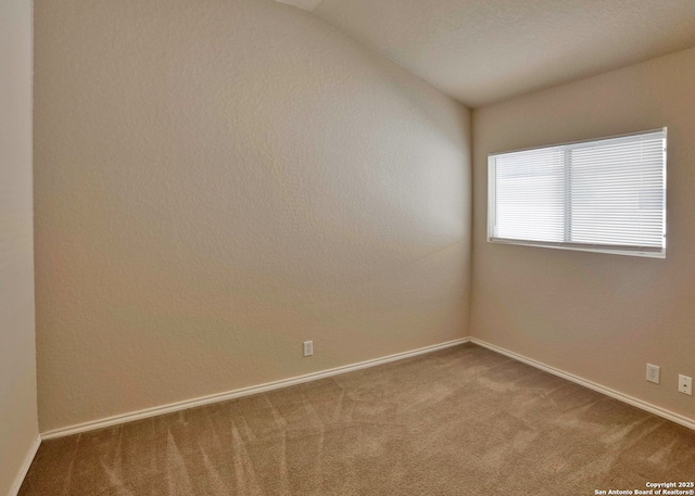 7319 Tranquillo Way, San Antonio, TX 78266 - empty room with carpet floors, baseboards, and lofted ceiling