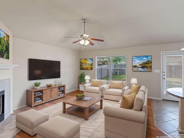 7319 Tranquillo Way, San Antonio, TX 78266 - living area featuring light wood-style flooring, a ceiling fan, and baseboards