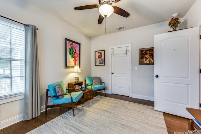 2045 W Mistletoe Ave, San Antonio, TX 78201 - sitting room with ceiling fan, baseboards, and wood finished floors