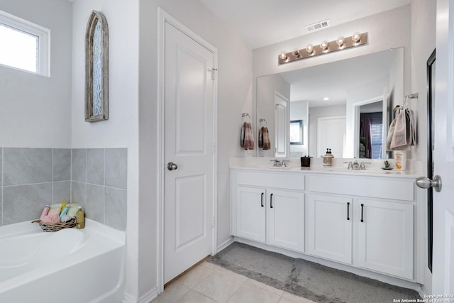 29416 Autumn Copper, Bulverde, TX 78163 - bathroom featuring double vanity, a garden tub, and tile patterned flooring