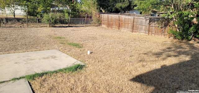 359 Revlon, San Antonio, TX 78227 - view of yard with a patio area