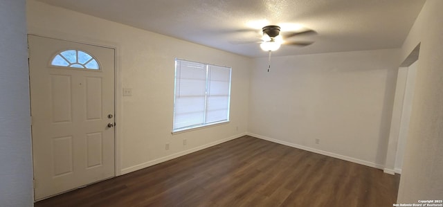 359 Revlon, San Antonio, TX 78227 - foyer featuring dark wood finished floors, ceiling fan, and baseboards