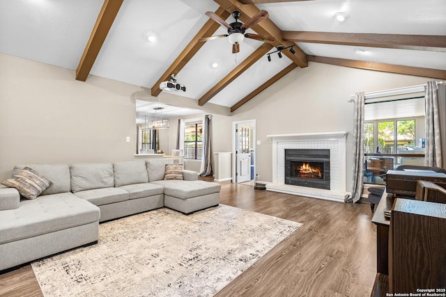 2002 Encino Vly, San Antonio, TX 78259 - living area with a fireplace, a ceiling fan, wood finished floors, recessed lighting, and baseboards