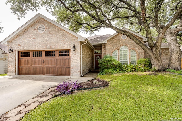 6502 Amber Oak, San Antonio, TX 78249 - ranch-style house with an attached garage, driveway, brick siding, a front lawn, and roof with shingles
