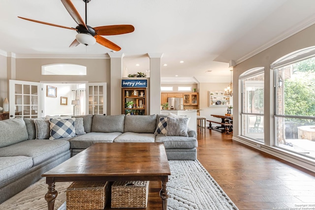 6502 Amber Oak, San Antonio, TX 78249 - living area featuring crown molding, a ceiling fan, and wood finished floors